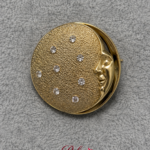 Vintage Gold-Tone Celestial Face Brooch with Crystal Accents